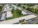 Extensive community featuring neatly arranged residences, green spaces, and designated parking areas at 4160 Fruitville Rd # 77, Sarasota, FL 34232