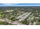 Beautiful aerial view of multi-building complex with a pool and easy access to the surrounding neighborhood at 4160 Fruitville Rd # 77, Sarasota, FL 34232