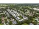 Attractive aerial view of the property highlighting the community pool and beautiful surrounding lush landscaping at 4160 Fruitville Rd # 77, Sarasota, FL 34232
