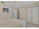 Cozy bedroom features white carpet and ceiling fan at 4160 Fruitville Rd # 77, Sarasota, FL 34232