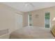 Bedroom with neutral tones and bright natural light at 4160 Fruitville Rd # 77, Sarasota, FL 34232