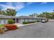 Condominium with neat landscaping and a paved parking area at 4160 Fruitville Rd # 77, Sarasota, FL 34232