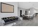 Game room with Foosball table, white folding tables and chairs, and laminate floors at 4160 Fruitville Rd # 77, Sarasota, FL 34232