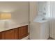 Laundry area showcasing a stacked washer and dryer unit at 4160 Fruitville Rd # 77, Sarasota, FL 34232