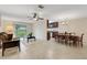 Open-plan living space merging a living room and dining area at 4160 Fruitville Rd # 77, Sarasota, FL 34232