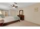 Bedroom featuring ceiling fan, neutral walls, and a serene ambiance for relaxation and rest at 4160 Fruitville Rd # 77, Sarasota, FL 34232