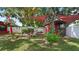 Charming backyard seating area under mature shade trees with a quaint gazebo at 5501 Highland S St, St Petersburg, FL 33705