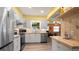Modern kitchen with stainless steel appliances, butcher block countertops and laminate flooring at 5501 Highland S St, St Petersburg, FL 33705