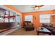 Comfortable living room with access to outdoor patio, offering lots of natural light and relaxed seating at 5501 Highland S St, St Petersburg, FL 33705