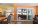 View of interior living space to outdoor patio, flowing directly into kitchen, with great natural light at 5501 Highland S St, St Petersburg, FL 33705