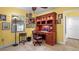 Bright home office featuring a wooden desk with storage, a comfortable chair, and natural light for work at 5501 Highland S St, St Petersburg, FL 33705