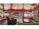 Comfortable outdoor patio with stylish seating, arched openings to the garden, and attractive decor at 5501 Highland S St, St Petersburg, FL 33705