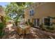 Brick-paved patio with outdoor dining set, ideal for gatherings and outdoor living at 635 Bay Ne St, St Petersburg, FL 33701