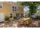 Outdoor dining area with patio table and chairs in brick backyard, perfect for entertaining at 635 Bay Ne St, St Petersburg, FL 33701