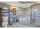 Ceramic tile bathroom with soaking tub, glass enclosed shower, and pedestal sink, and modern fixtures at 635 Bay Ne St, St Petersburg, FL 33701