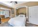 Bright bedroom featuring a ceiling fan, stylish columns, and a comfortable bed, creating a relaxing and inviting space at 635 Bay Ne St, St Petersburg, FL 33701