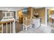 Inviting bedroom featuring a plush bed, a mini-fridge, and an adjacent bathroom, offering comfort and convenience at 635 Bay Ne St, St Petersburg, FL 33701
