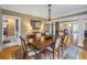 Dining room with hardwood floors, traditional furniture and pendant lighting at 635 Bay Ne St, St Petersburg, FL 33701