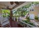 Inviting front porch with rocking chairs and brick columns, perfect for relaxing outdoors at 635 Bay Ne St, St Petersburg, FL 33701