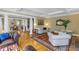 Elegant living room with coffered ceilings, hardwood floors, and classic furniture at 635 Bay Ne St, St Petersburg, FL 33701