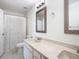 Bright bathroom featuring double sinks and a shower-tub combo at 780 Sarabay Rd # 16, Osprey, FL 34229