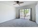 Bedroom with sliding glass door and backyard patio at 780 Sarabay Rd # 16, Osprey, FL 34229