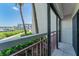 Private balcony offering scenic views of the marina and lush landscaping at 7907 Sailboat Key S Blvd # 108, South Pasadena, FL 33707