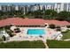 An overhead view reveals a sparkling pool near the clubhouse, perfect for socializing and enjoying the sun at 7907 Sailboat Key S Blvd # 108, South Pasadena, FL 33707