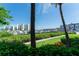 Waterfront community featuring boat docks surrounded by lush greenery and clear blue skies at 7907 Sailboat Key S Blvd # 108, South Pasadena, FL 33707