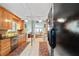 Charming kitchen with stainless steel appliances, tile backsplash, and inviting open floor plan at 7907 Sailboat Key S Blvd # 108, South Pasadena, FL 33707