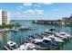 Picturesque marina view with boats docked on the water, showcasing waterfront living and recreational opportunities at 7907 Sailboat Key S Blvd # 108, South Pasadena, FL 33707