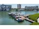 Close aerial view of the community boat dock and marina, showcasing boat storage and convenient waterfront living at 7907 Sailboat Key S Blvd # 108, South Pasadena, FL 33707