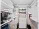 Organized walk-in closet with custom shelving and ample storage space at 7907 Sailboat Key S Blvd # 108, South Pasadena, FL 33707