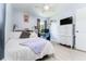 Cozy bedroom with a light color, white furniture, and lots of natural light at 909 Silver Palm Way, Apollo Beach, FL 33572