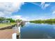 Waterfront property with private boat dock and scenic water views at 909 Silver Palm Way, Apollo Beach, FL 33572