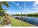 Waterfront property with private boat dock and scenic water views at 909 Silver Palm Way, Apollo Beach, FL 33572