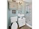 Cozy bathroom featuring a vanity with cabinet, shower, and fixtures at 1042 S Sterling Ave, Tampa, FL 33629