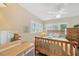 Bright bedroom with natural lighting and a ceiling fan, creating a comfortable atmosphere at 1042 S Sterling Ave, Tampa, FL 33629