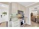 Kitchen with stainless steel appliances, granite counters, and convenient microwave placement at 1042 S Sterling Ave, Tampa, FL 33629