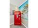 This living room is decorated with a classic Coca-Cola machine at 1042 S Sterling Ave, Tampa, FL 33629