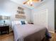 Cozy bedroom with decorative wall art and closet at 1358 Forestedge Blvd, Oldsmar, FL 34677
