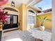 Inviting front entrance featuring double doors, stone accents, and a decorative window at 1358 Forestedge Blvd, Oldsmar, FL 34677