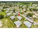 Aerial view of the community, showing the well-maintained landscaping and nearby amenities at 1905 Canterbury Ln # 17, Sun City Center, FL 33573