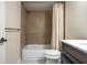 Bathroom features a shower and tub combo with a white vanity and chrome fixtures at 200 Gretchen Ct, Oldsmar, FL 34677