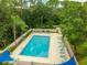 Relaxing community pool area featuring lounge chairs, providing a perfect spot for residents to unwind at 200 Gretchen Ct, Oldsmar, FL 34677