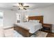 Comfortable main bedroom with soft lighting, ceiling fan, and plush rug at 200 Gretchen Ct, Oldsmar, FL 34677