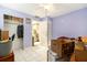 Bedroom featuring tile floor, ceiling fan and closet at 2149 Dixie Garden Loop, Holiday, FL 34690