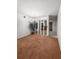 Dining room with a mirrored wall and view of living room at 2460 Persian Dr # 44, Clearwater, FL 33763
