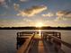 Scenic dock with stunning sunset view, perfect for enjoying the water at 2460 Persian Dr # 44, Clearwater, FL 33763
