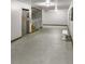 Hallway with elevator and stairs, providing convenient access to all floors at 2460 Persian Dr # 44, Clearwater, FL 33763